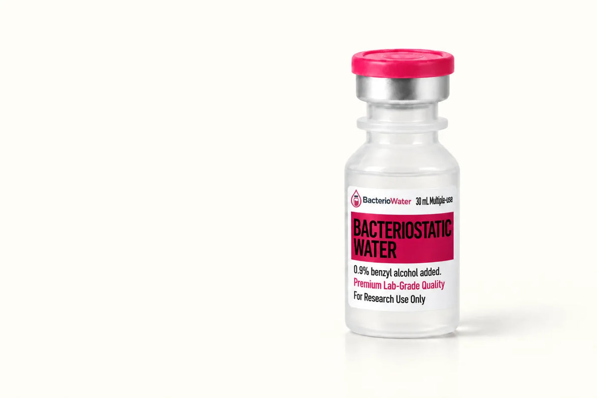 30 mL bacteriostatic water vial with pink flip-off cap on a laboratory bench